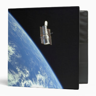 The Hubble Space Telescope with a blue earth Binder
