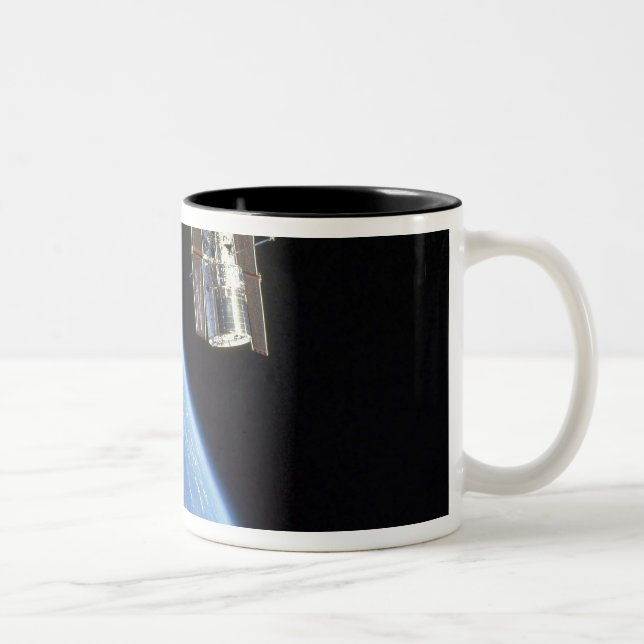 The Hubble Space Telescope with a blue earth Two-Tone Coffee Mug (Right)