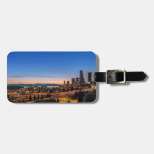 The I-5 freeway and downtown Seattle at twilight Luggage Tag