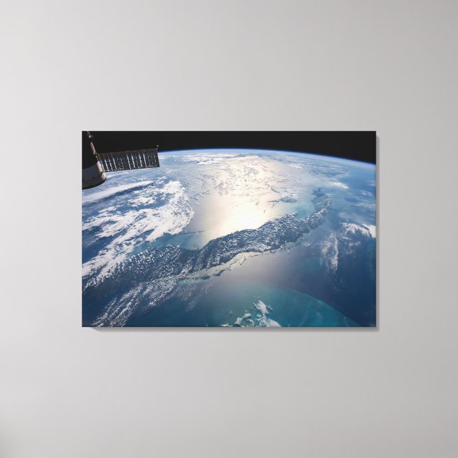 The International Spce Station Above The Atlantic Canvas Print (Front)