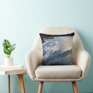 The International Spce Station Above The Atlantic Throw Pillow