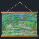 The Japanese Footbridge Claude Monet Hanging Tapestry<br><div class="desc">Bring Impressionist serenity into your home! This wood topped wall tapestry features Claude Monet’s The Japanese Footbridge (1899), a luminous painting of his Giverny water garden. The graceful arched bridge glows above a reflective pond alive with greens, pinks, and blues, painted in fluid brushstrokes that capture the beauty of spring....</div>