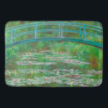 The Japanese Footbridge Monet Bath Mat<br><div class="desc">Step into Impressionist beauty every day! This bath mat showcases Claude Monet’s The Japanese Footbridge (1899), a romantic oil on canvas that captures the painter’s famed garden in Giverny. The arched bridge stretches gracefully over shimmering water, where vibrant shades of green, pink, and blue reflect in a dreamy play of...</div>