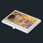 The Kiss by Gustav Klimt, Vintage Art Nouveau Business Card Holder<br><div class="desc">The ultimate painting of love, a beautiful design to celebrate Valentine's Day with! The Kiss (detail) (1907-1908) by Gustav Klimt is a vintage Victorian Era Symbolism fine art love and romance painting featuring a romantic couple in various shades of gold, patterns and symbols, sharing a kiss against a bronze background....</div>