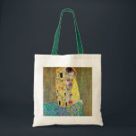 The Kiss by Gustav Klimt, Vintage Art Nouveau Tote Bag<br><div class="desc">The Kiss (Der Kuss) (1907/08) by Gustav Klimt is probably his most famous work. Klimt began work on it in 1907 and it is the highpoint of his so-called 'Golden Period'. The Kiss is a vintage Victorian Era Symbolism fine art love and romance painting featuring a romantic couple in various...</div>