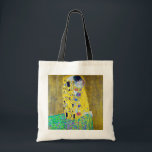 The Kiss, Gustav Klimt Tote Bag<br><div class="desc">Gustav Klimt (July 14, 1862 – February 6, 1918) was an Austrian symbolist painter and one of the most prominent members of the Vienna Secession movement. Klimt is noted for his paintings, murals, sketches, and other objets d'art. In addition to his figurative works, which include allegories and portraits, he painted...</div>