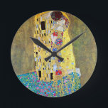The Kiss (original Der Kuss) by Gustav Klimt Round Clock<br><div class="desc">The Kiss (1907-1908). Artist: Gustav Klimt (1862-1918). The Kiss (original Der Kuss) is probably Gustav Klimt's most famous work. He began work on it in 1907 and it is the highpoint of his so-called 'Golden Period'. The Kiss is a vintage Victorian Era Symbolism fine art love and romance painting featuring...</div>