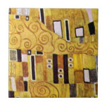 The Kiss Pattern by Gustav Klimt, Art Nouveau Tile<br><div class="desc">The Kiss (pattern detail) by Gustav Klimt is a vintage fine art Victorian Era Symbolism painting. This detail is from a love and romance painting featuring a romantic couple in various shades of gold, symbols and patterns, sharing a kiss against a bronze background. About the artist: Gustav Klimt (1862-1918) was...</div>