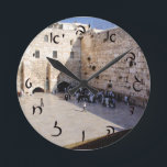 The Kotel - Hebrew Script Lettering Round Clock<br><div class="desc">The "Hebrew Essentials, " Consumer Marketplace offers a shopping experience as you will not find anywhere else. Our specialty is Hebrew,  and in our store your will find Hebrew in block,  script,  and Rashi script.  Tell your friends about us and send them our link:  http://www.zazzle.com/HebrewNames?rf=238549869542096443*  ENJOY YOUR VISIT!</div>