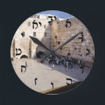 The Kotel - Rashi Script Round Clock<br><div class="desc">The "Hebrew Essentials, " Consumer Marketplace offers a shopping experience as you will not find anywhere else. Our specialty is Hebrew, and in our store your will find Hebrew in block, script, and Rashi script. Tell your friends about us and send them our link: http://www.zazzle.com/HebrewNames?rf=238549869542096443* ENJOY YOUR VISIT!</div>