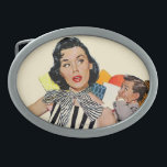 The Lady Was Insulted Oval Belt Buckle<br><div class="desc">Artist:Mike Ludlow | Woman in black & white striped dress looks back at man on couch</div>