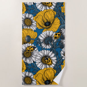 The meadow in yellow and blue beach towel