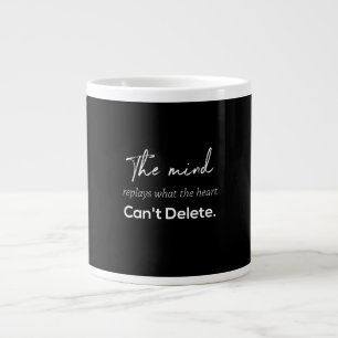 the mind replays what the heart can't delete large coffee mug