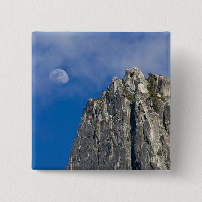 The moon rises and shines through the clouds 2 inch square button (Front)