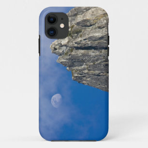 The moon rises and shines through the clouds iPhone 11 case