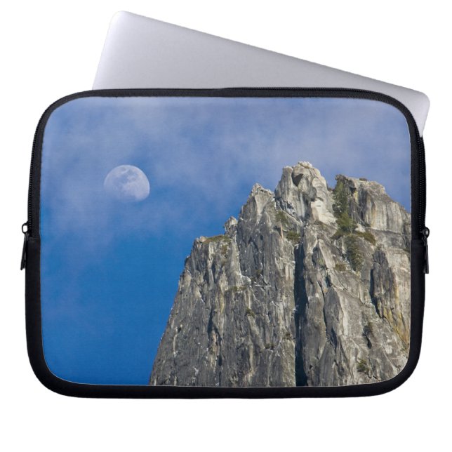 The moon rises and shines through the clouds laptop sleeve (Front)