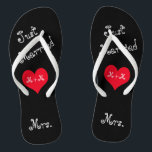 The Mrs. of Mr. & Mrs. Just Married Flip Flops<br><div class="desc">These fun Just Married flip flops are the perfect gift for the bride to be. The design features black flip flops with the words "Just Married" in a fun girly typography at an angle. In the middle is a red heart with your initials or monograms. At the heal is the...</div>