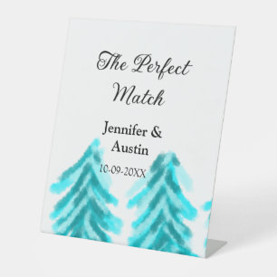 The perfect match winter blue pine tree wedding na pedestal sign