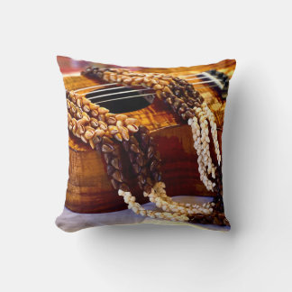 The pillow features a detailed image of a ukulele