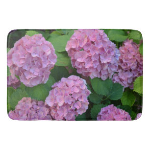The pink Hortensia hydrangea bush Bath Mat