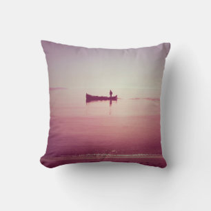 The silhouette of fisherman with boat in the sea v throw pillow