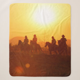 The silhouette of rider as cowboy outfit costume w sherpa blanket