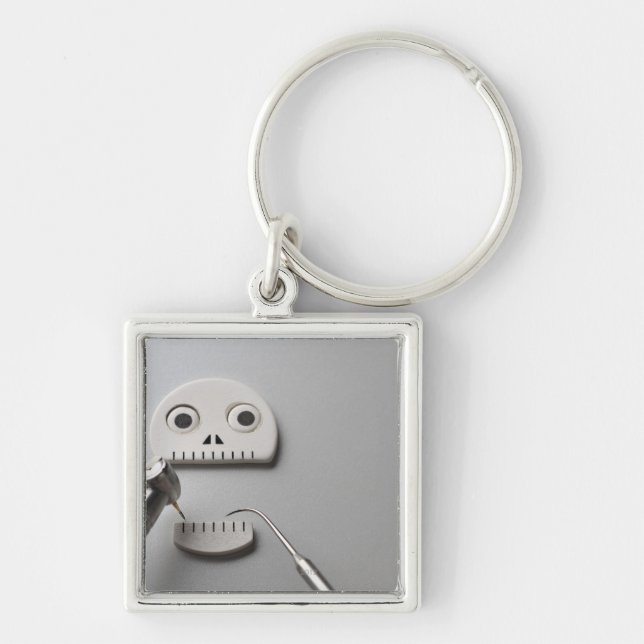 The skeleton which dental treatment is taken keychain (Front)