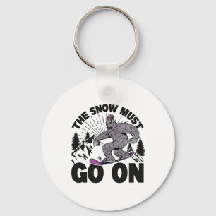 The Snow Must Go On - Snowboarding - Skiing 1 Keychain