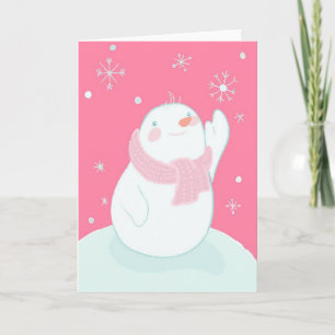 The snowman reaching for falling snowflake holiday card