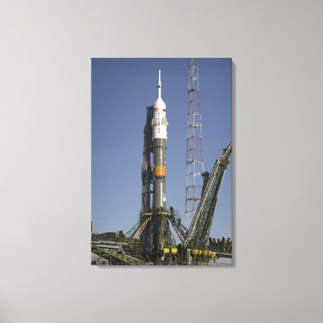 The Soyuz rocket is erected into position 2 Canvas Print (Front)