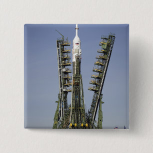 The Soyuz rocket is erected into position 4 2 Inch Square Button