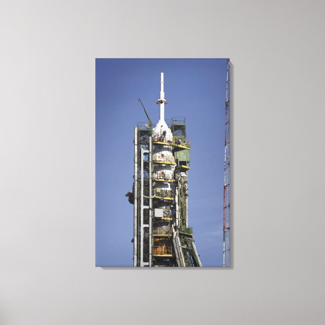 The Soyuz rocket is erected into position Canvas Print (Front)