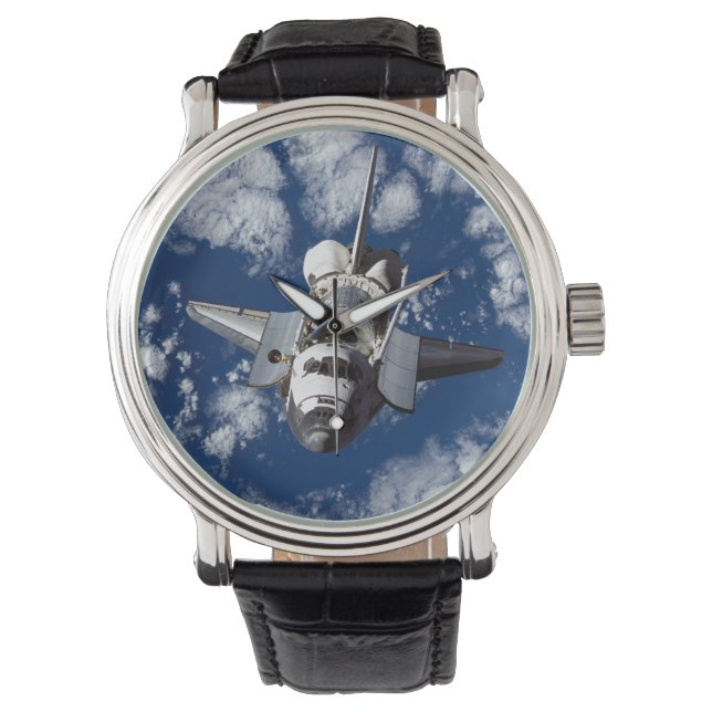 The Space Shuttle Over Earth Watch (Front)