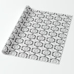 The Star of David - Wrapping Paper<br><div class="desc">The Jewish Holiday Hanukkah. This black and white design features the "Star of David". Stars surround the Star of David in an oval shape. The corners are decorated with leaves and the Star of David. This wrapping paper comes in assortment of styles.</div>