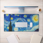 The Starry Night | Van Gogh | Desk Mat<br><div class="desc">The Starry Night is an oil-on-canvas painting by the Dutch Post-Impressionist painter Vincent van Gogh. Painted in June 1889, it depicts the view from the east-facing window of his asylum room at Saint-Rémy-de-Provence, just before sunrise, with the addition of an imaginary village.</div>