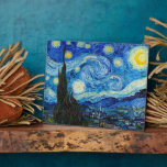 The Starry Night | Van Gogh | Plaque<br><div class="desc">The Starry Night is an oil-on-canvas painting by the Dutch Post-Impressionist painter Vincent van Gogh. Painted in June 1889, it depicts the view from the east-facing window of his asylum room at Saint-Rémy-de-Provence, just before sunrise, with the addition of an imaginary village.</div>