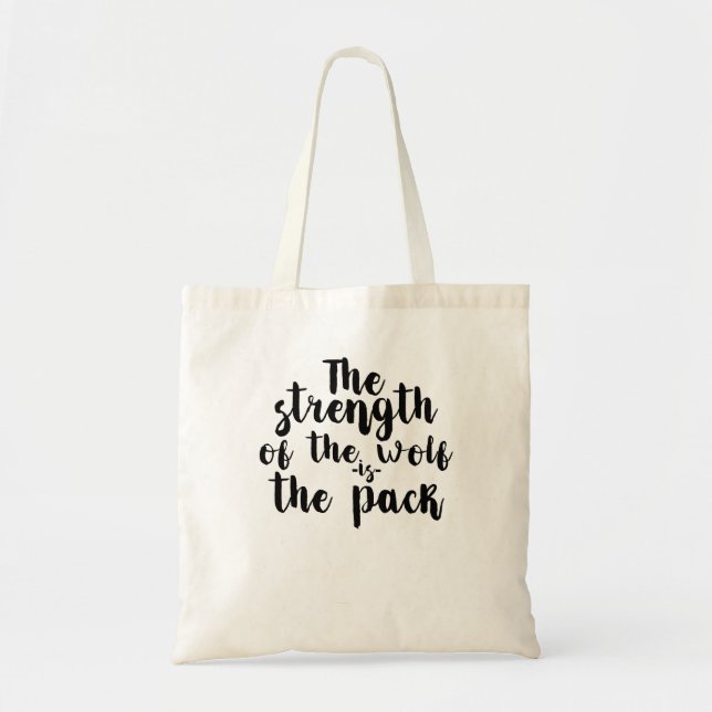 The Strength Of The Wolf Is the Pack Tote Bag (Front)