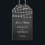 The String Lights On Chalkboard Wedding Collection Gift Tags<br><div class="desc">Simple yet elegant, the string lights on chalkboard wedding collection is a stunning design featuring lovely white hanging string lights on a chalkboard effect background, which is perfect for any modern wedding celebration. These tags can be personalized for your special occasion and would make the perfect item for your wedding,...</div>
