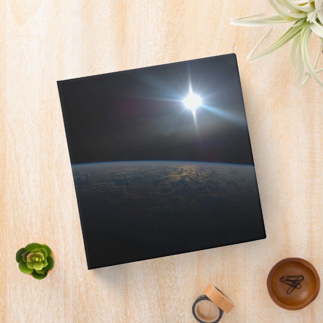 The Sun Setting Over Earth's Horizon. Binder (In Situ)