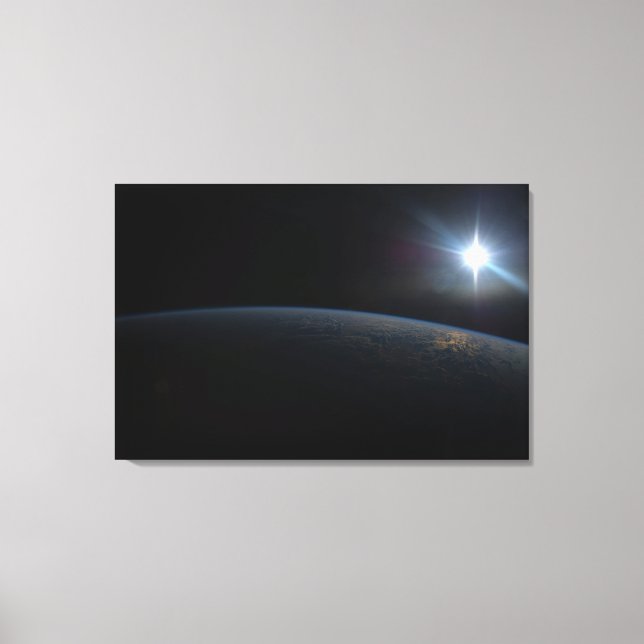 The Sun Setting Over Earth's Horizon. Canvas Print (Front)