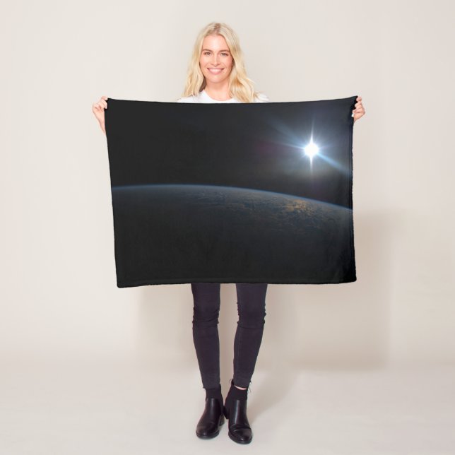 The Sun Setting Over Earth's Horizon. Fleece Blanket (In Situ)