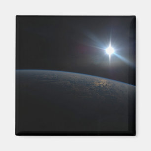 The Sun Setting Over Earth's Horizon. Magnet