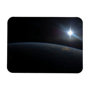 The Sun Setting Over Earth's Horizon. Magnet