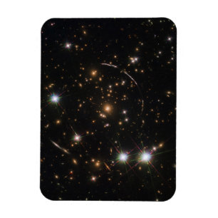 The Sunburst Arc In A Massive Galaxy Cluster Magnet