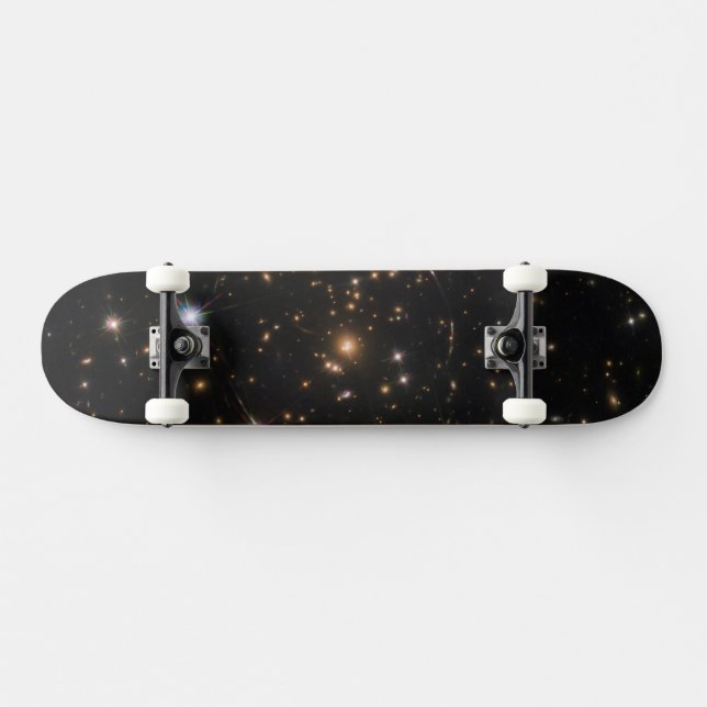 The Sunburst Arc In A Massive Galaxy Cluster Skateboard (Horz)