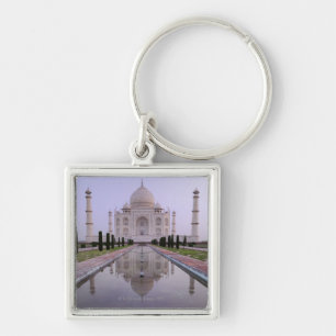 the Taj Mahal perfectly reflected in the pool in Keychain