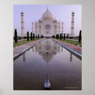 the Taj Mahal perfectly reflected in the pool in Poster