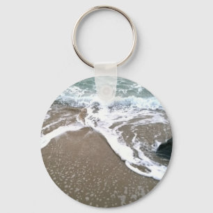 The Tide Washing Ashore Over the Rocks Keychain