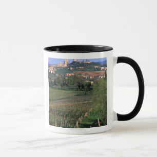 The village of San Gimignano sits in the rolling Mug