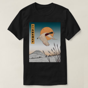 The water remains still after a bird takes flight T-Shirt